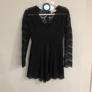 Zimmermann black lace sleeve romper
